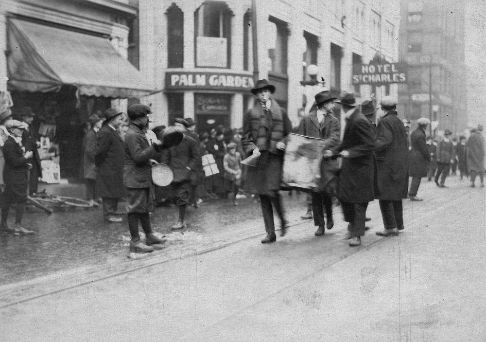 1918 - Young men during the Armistice Day celebrations on Bay St, looking southeast near Richmond St W