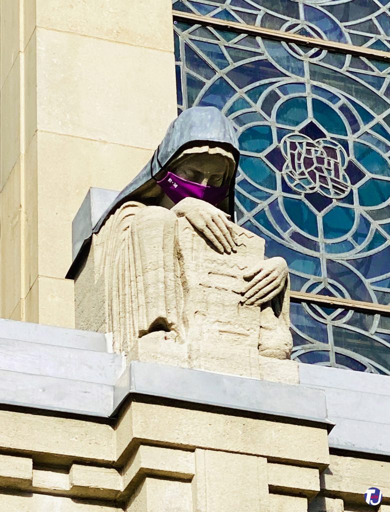 August 15, 2020 - A masked statue above the Weston Entrance at ROM