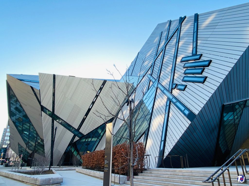 March 21, 2021 - The Michael Lee-Chin Crystal at the Royal Ontario Museum, looking southeast on Bloor St W towards Queen's Park