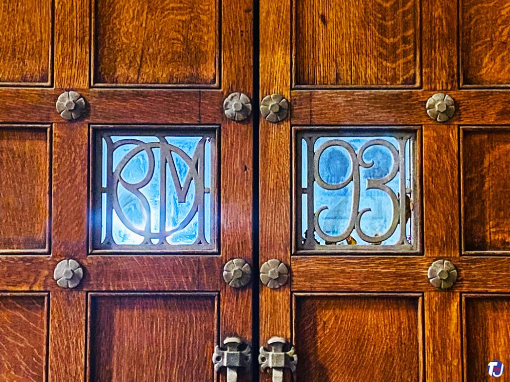 October 22, 2022 - The wood doors of the 1931-built portion of the Royal Ontario Museum along Queen's Park are adorned with intricate ironwork details
