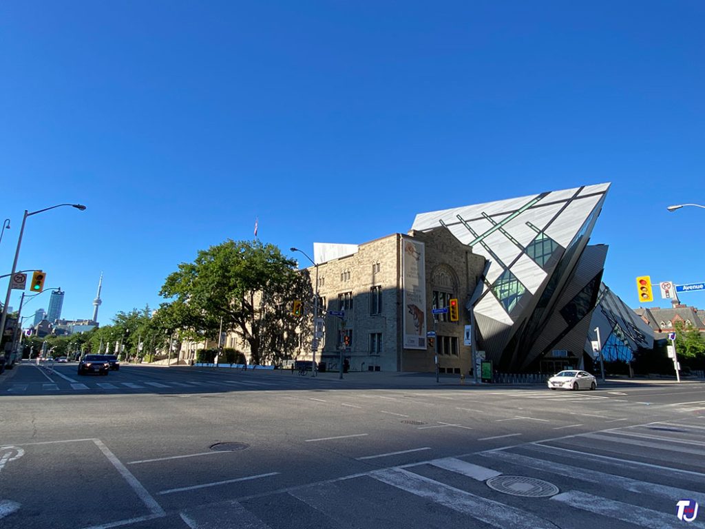 July 9, 2022 - Looking southwest towards the Royal Ontario Museum from Bloor St W and Avenue Rd. Notice the CN Tower in the background
