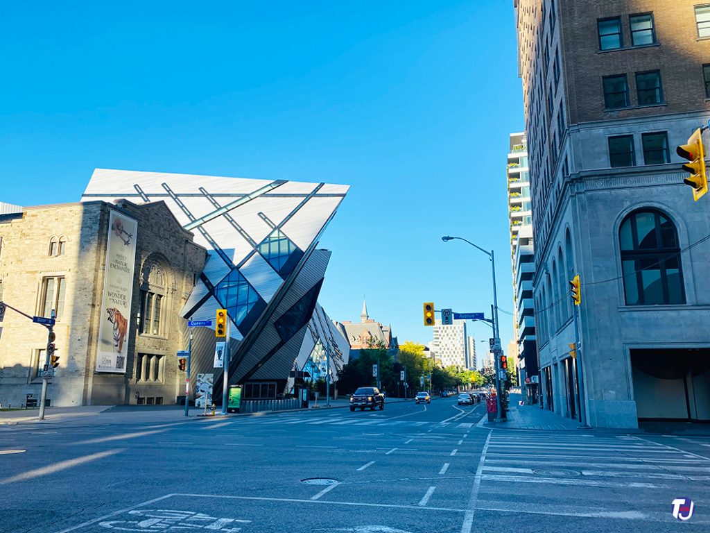August 27, 2022 - Looking west along Bloor St W from Avenue Rd in The Annex/Yorkville neighbourhoods, notice the Royal Ontario Museum on the left